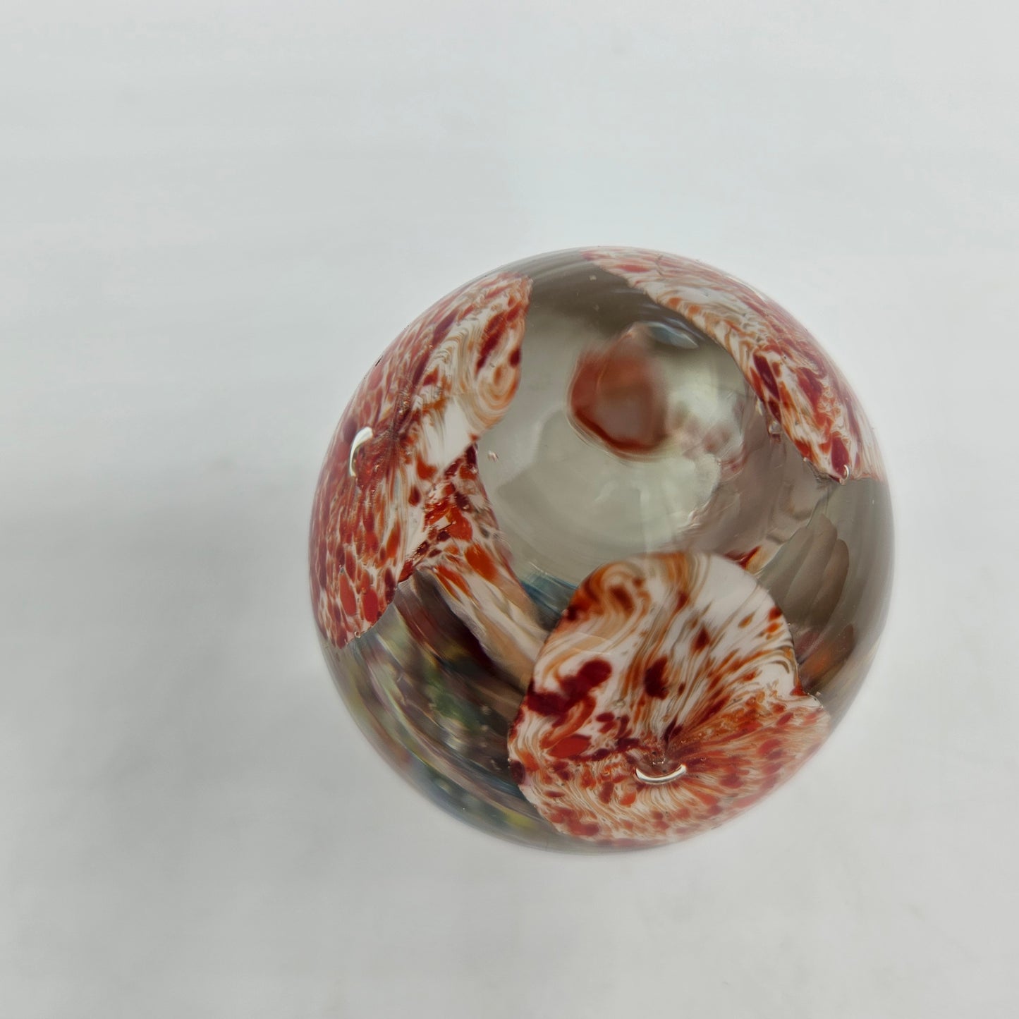 Art Glass Egg Shaped Paperweight with White and Orange Orchid Flowers. 3" tall, unsigned