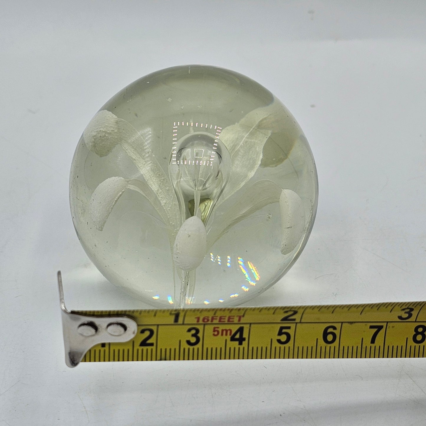 Art Glass Round Paperweight with White Lily. 2.5" diameter, unsigned