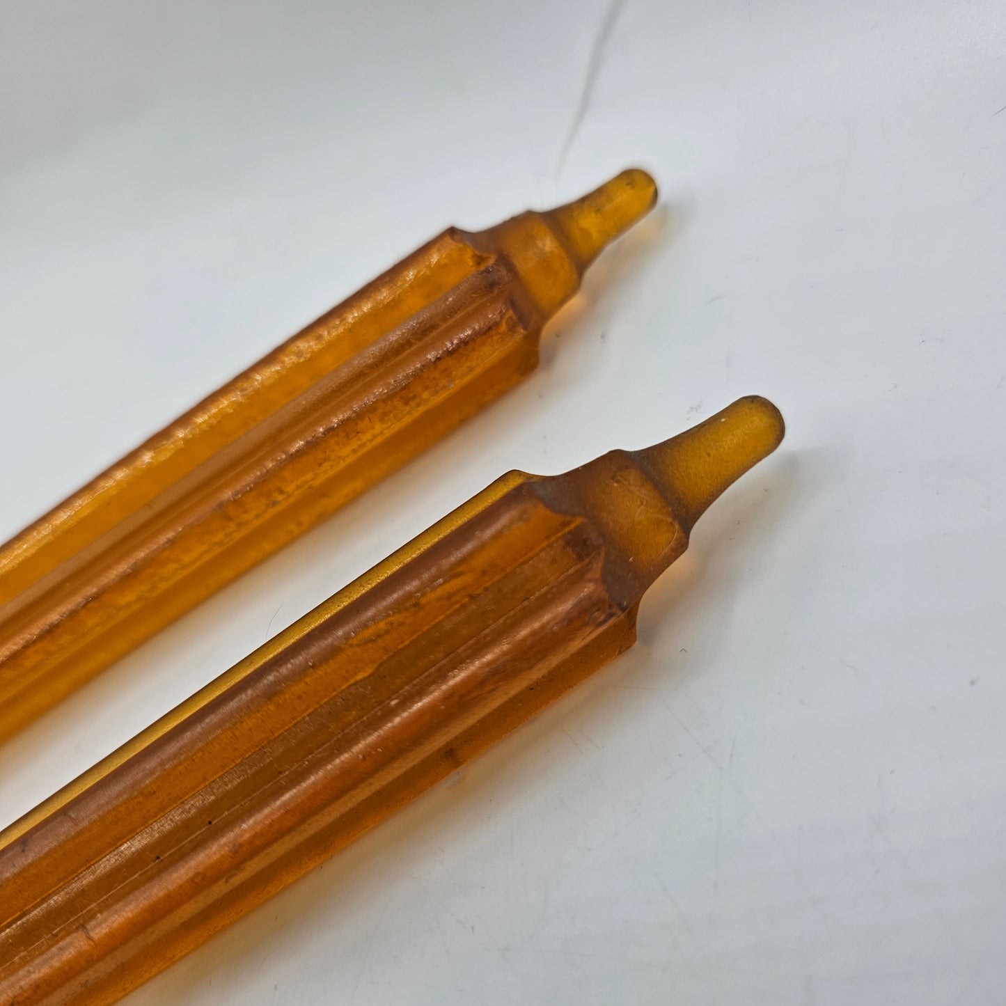 Pair of Vintage Ridged Lucite Orange Faux Taper Candles (no wicks)