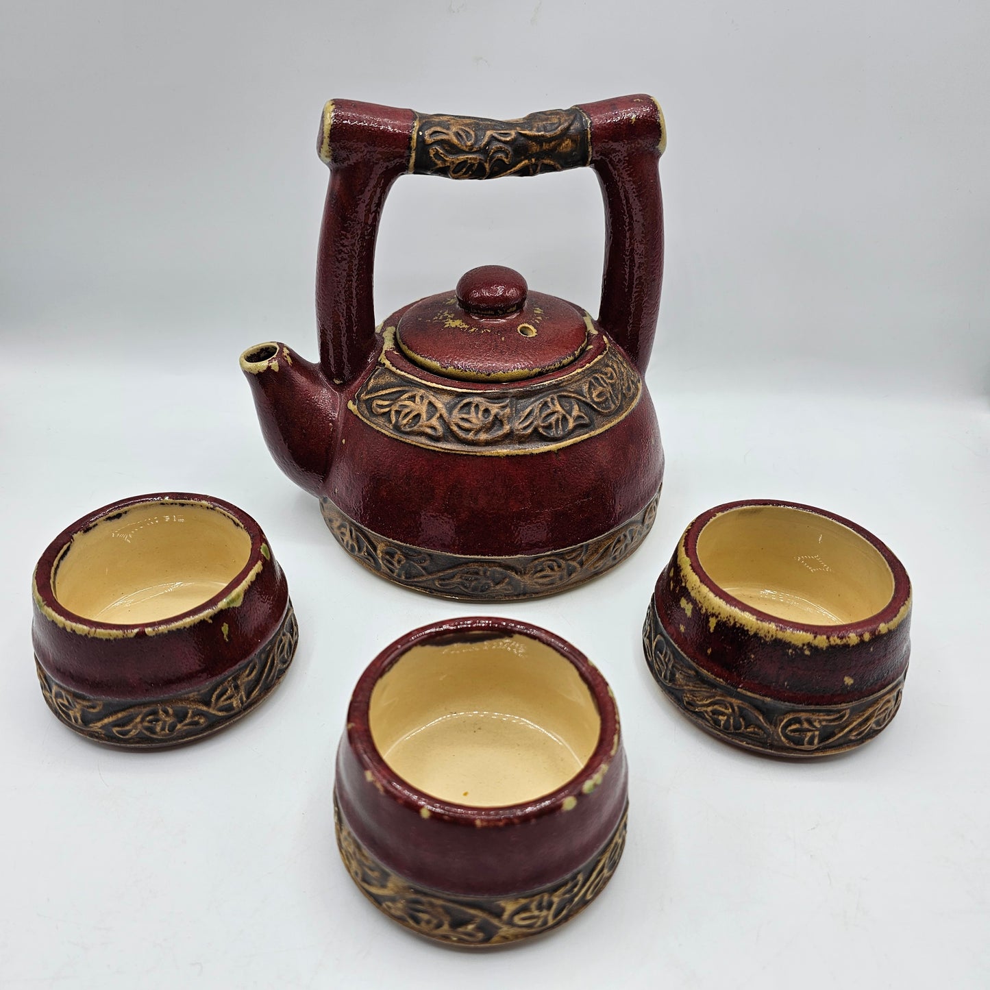 Intentionally Distressed Asian Teapot and Three Tea Cups by Pottery Barn