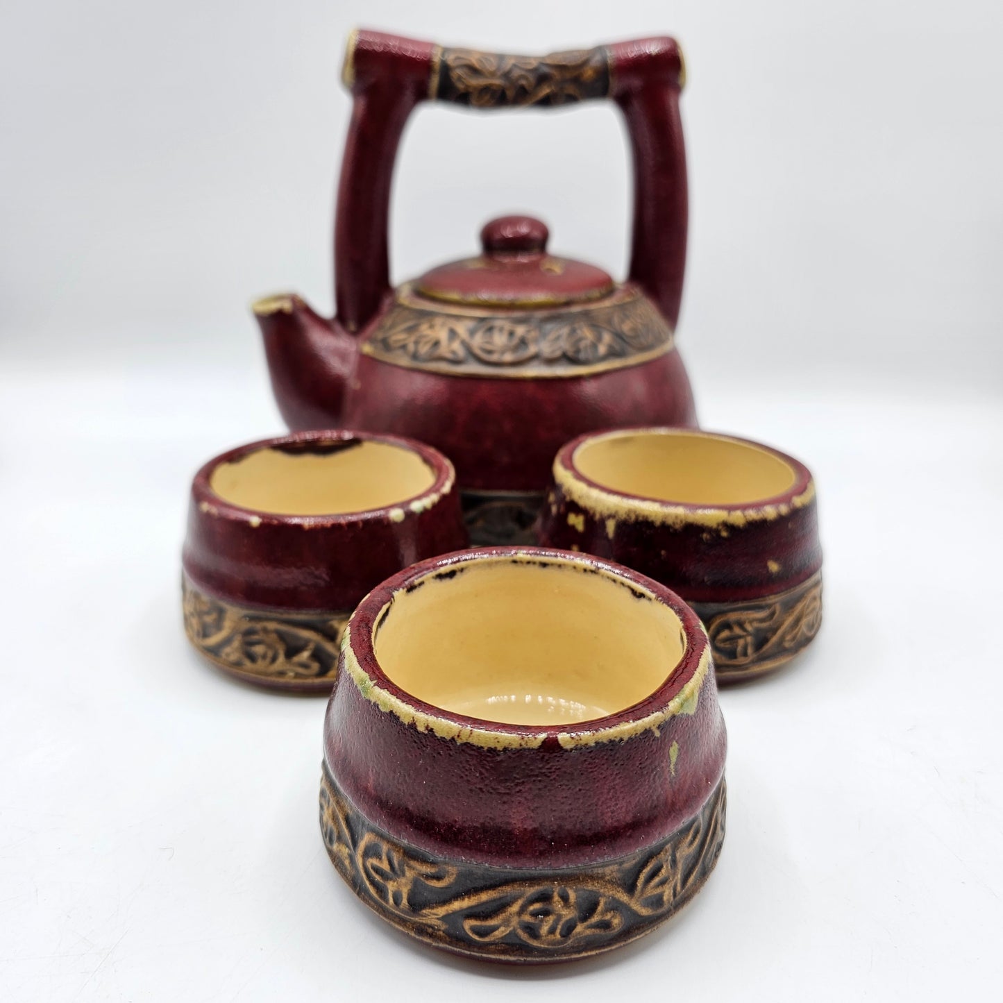 Intentionally Distressed Asian Teapot and Three Tea Cups by Pottery Barn