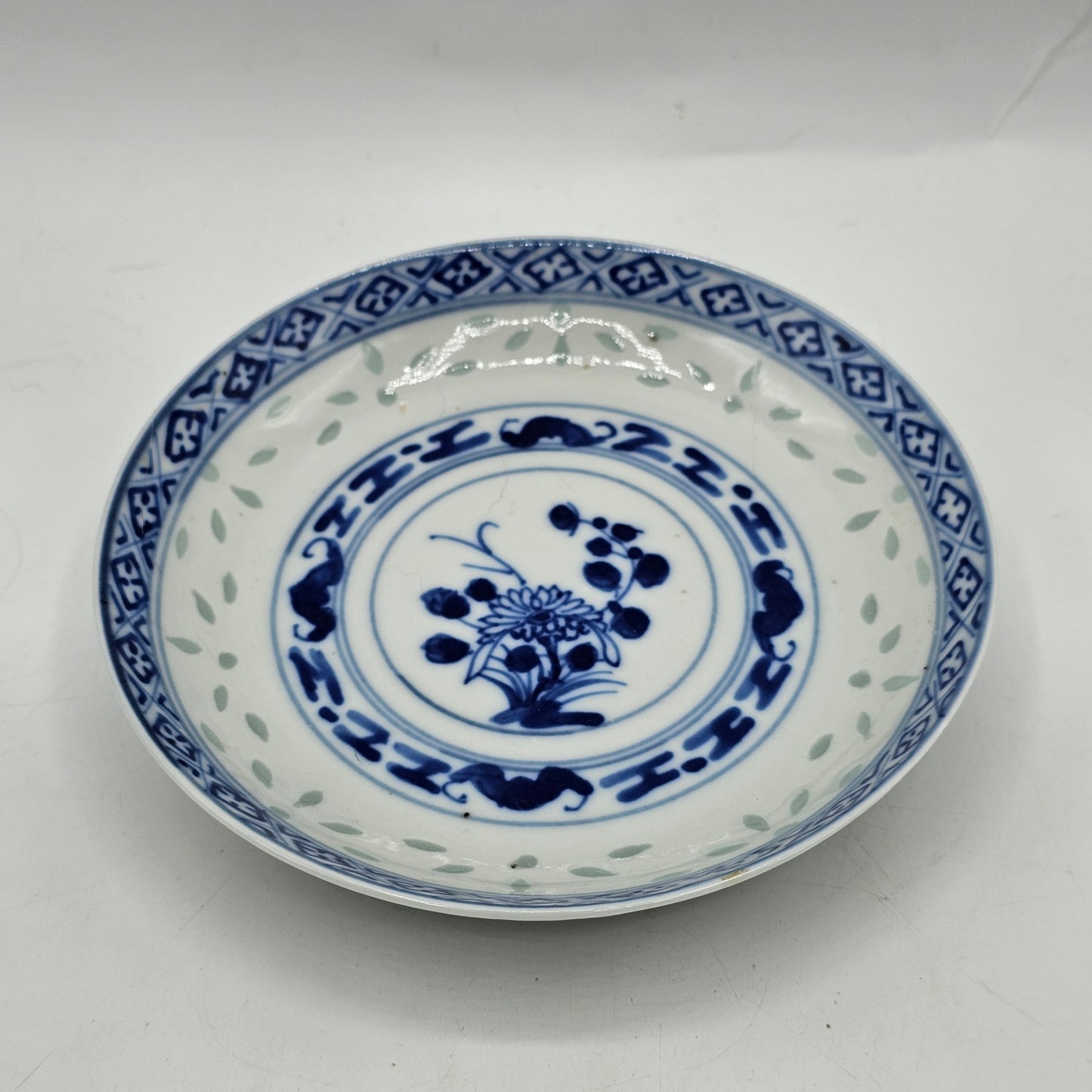Blue and White Painted Rice Grain Sauce Dish