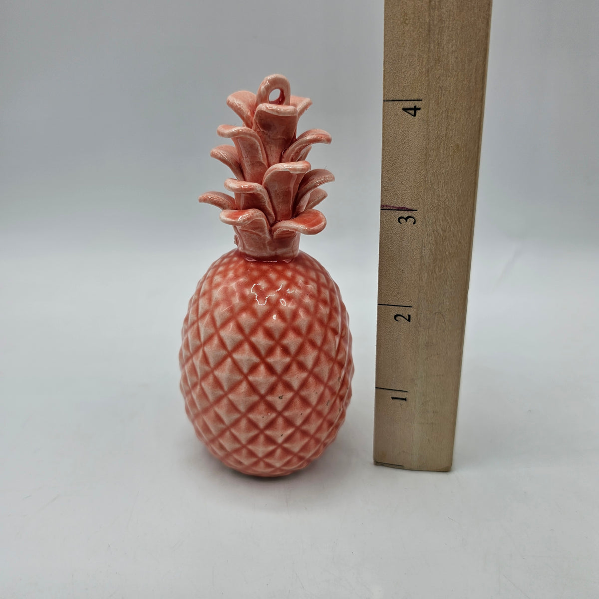 Pink Ceramic Pineapple Ornament with hole for hanging and hole in base