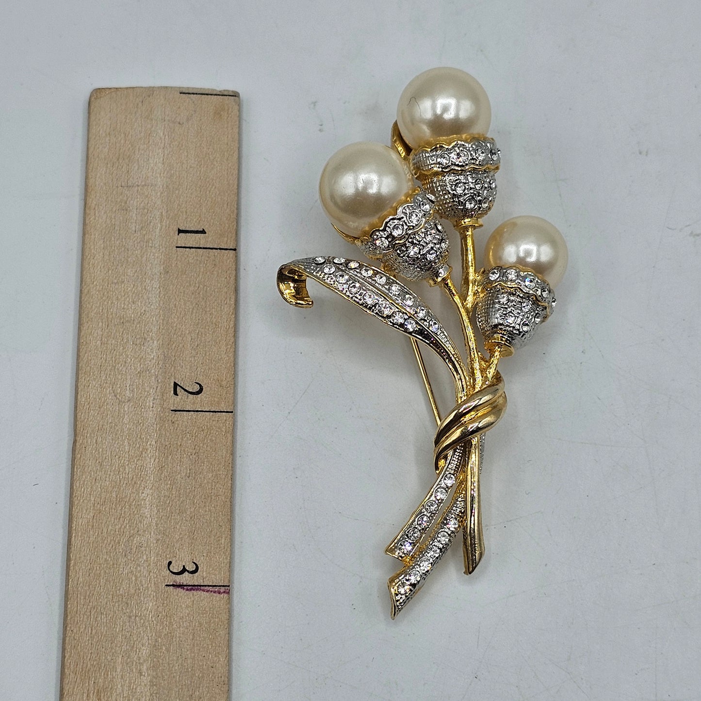 Floral Gold Tone Brooch with Crystals and Faux Pearls