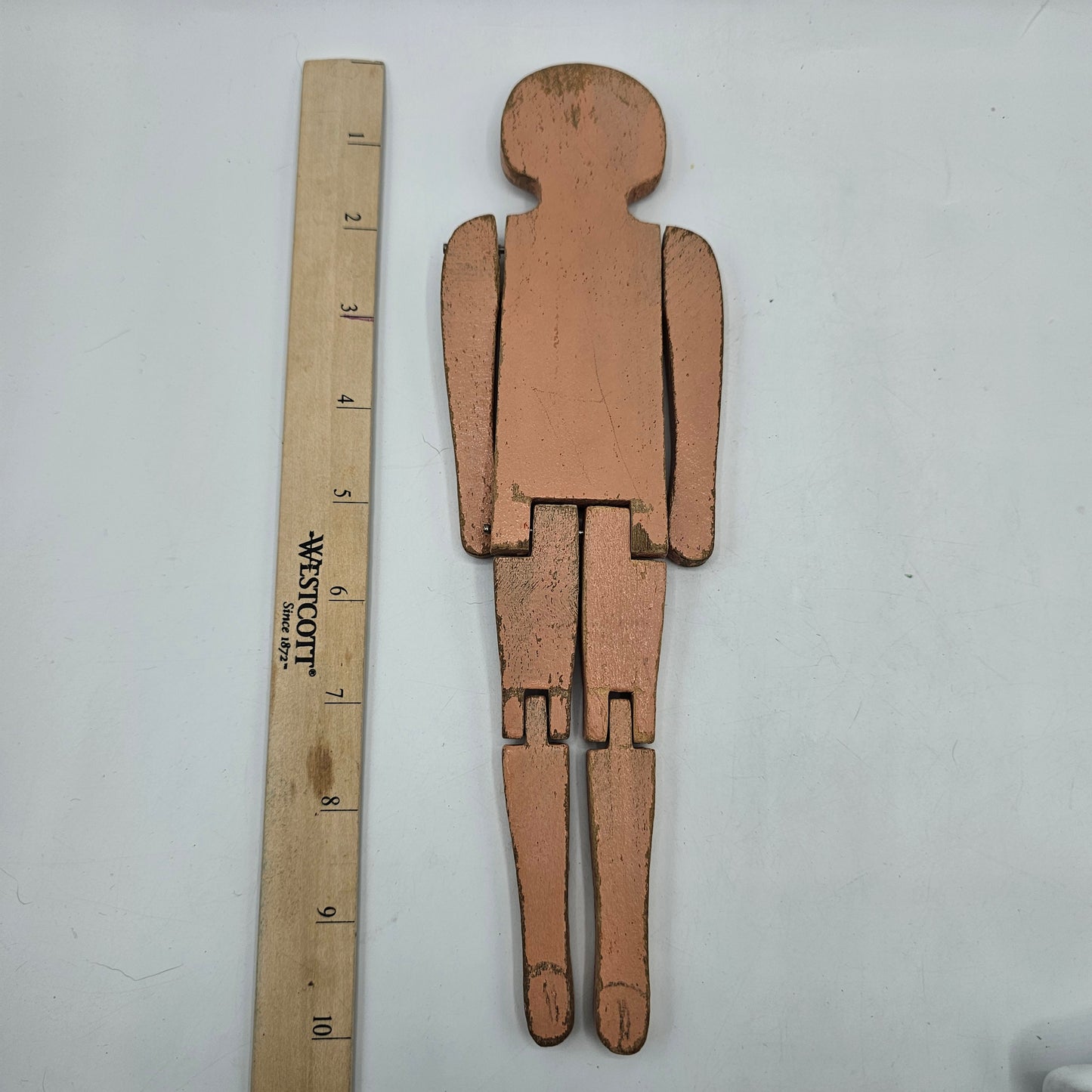 Antique Wooden Peg Doll with Articulated Legs and Painted Under Garment Detail