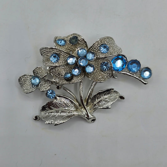 Silver Tone Flower Pin Brooch with Blue Crystals