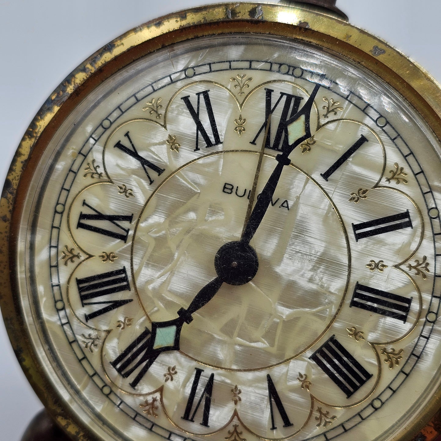 Vintage Bulova Wind Up Alarm Clock with Mother of Pearl Face and Gold Tone Lace Metal Accents - Made in Germany- DISPLAY OR PARTS ONLY DOESN'T WORK
