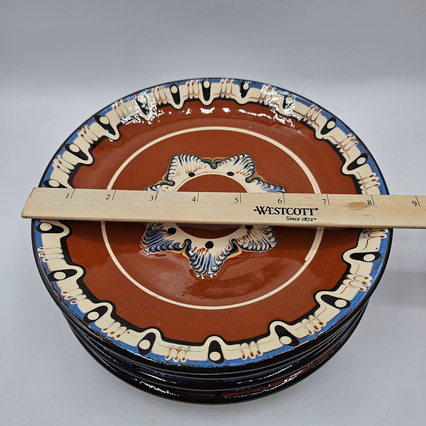 Bulgarian Troyan Pottery Plates, Handcrafted from Drip Glazed Terracotta Redware with a Feather Pulled Slip Design - Set of 4