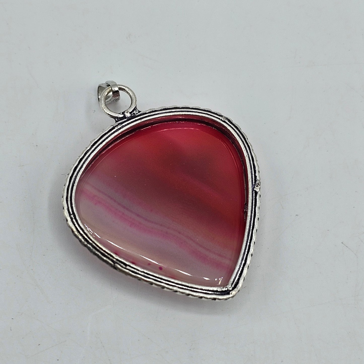 UV Reactive Banded Pink Onyx Stone Teardrop Pendant