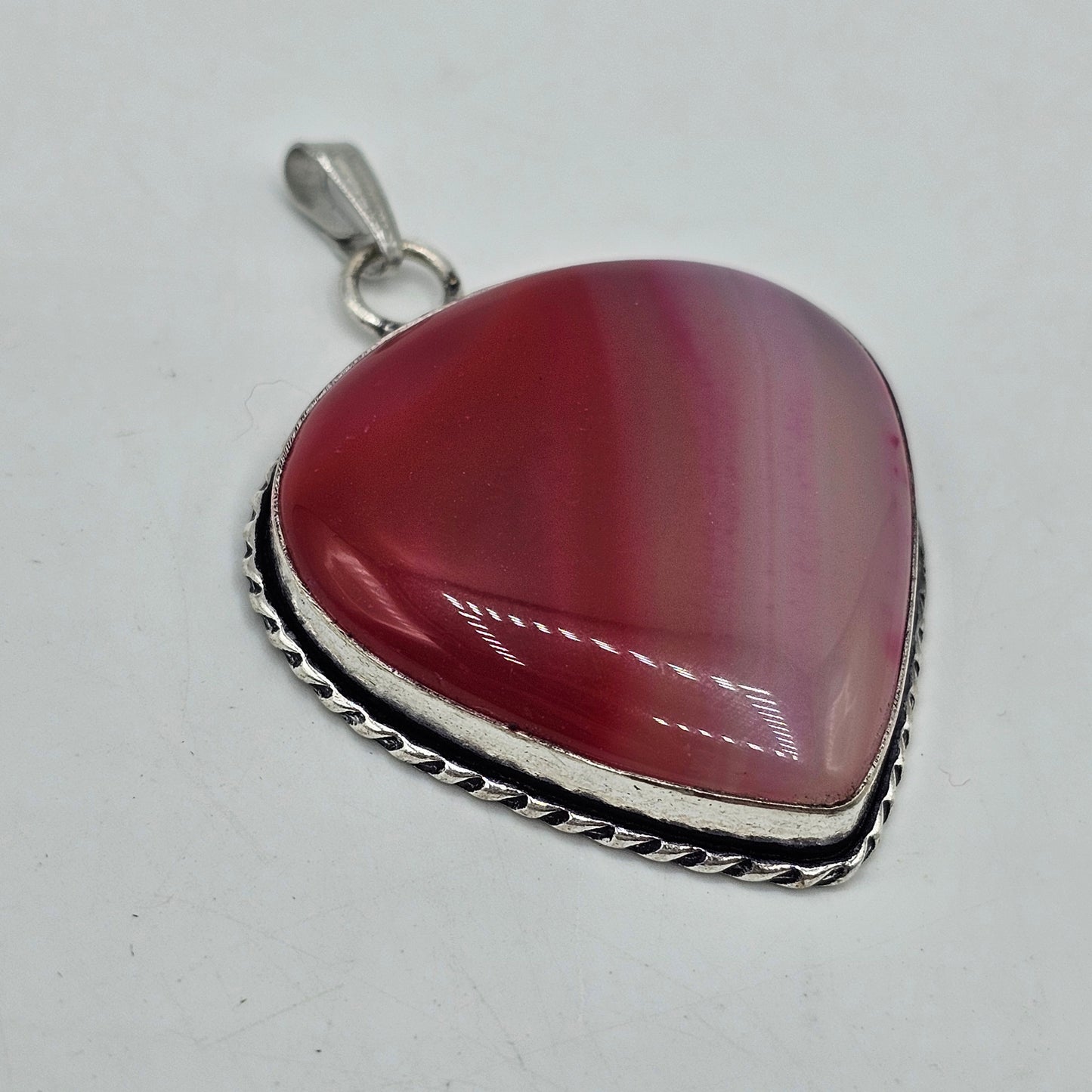 UV Reactive Banded Pink Onyx Stone Teardrop Pendant