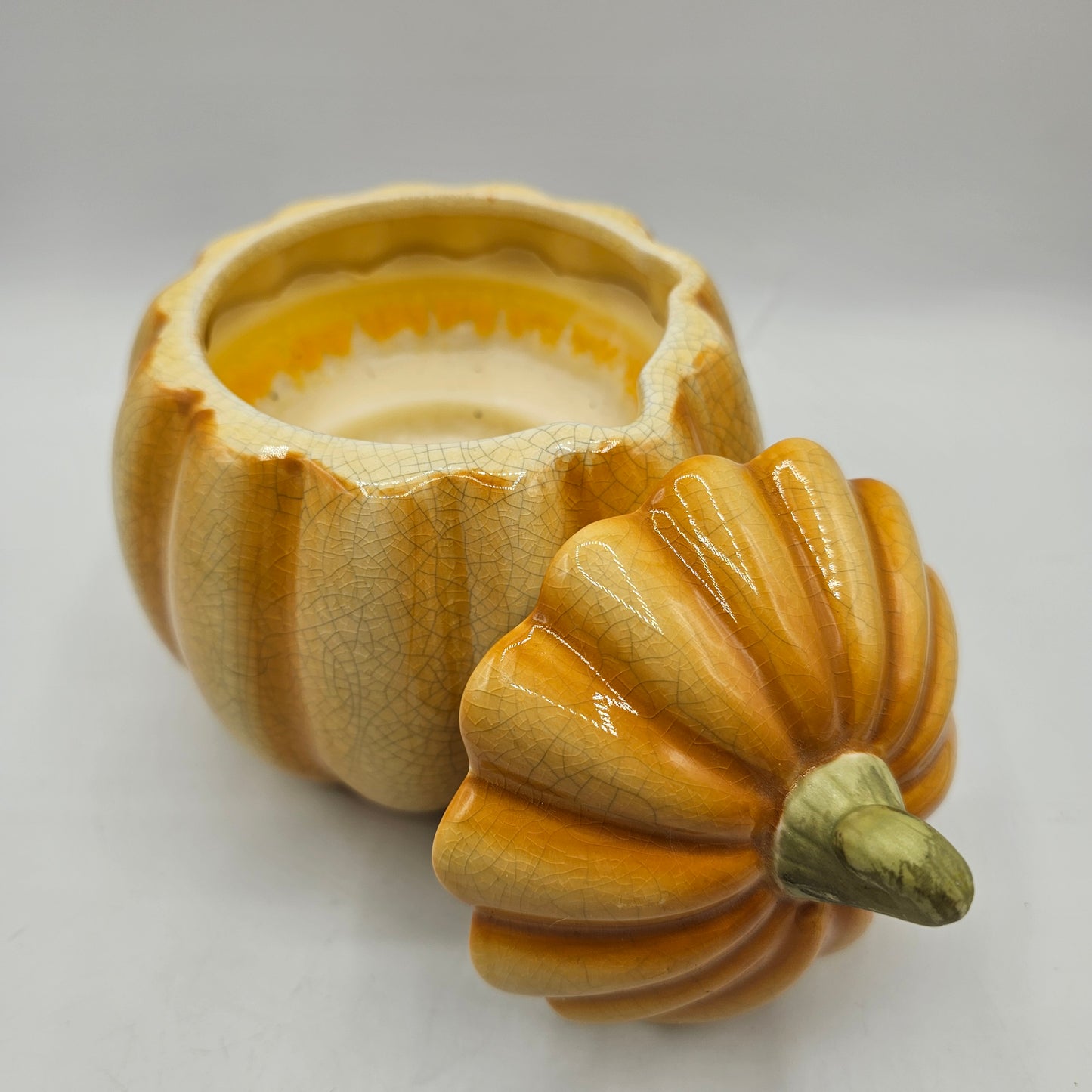 Orange Crackle Glazed Ceramic Pumpkin Candle - Lit