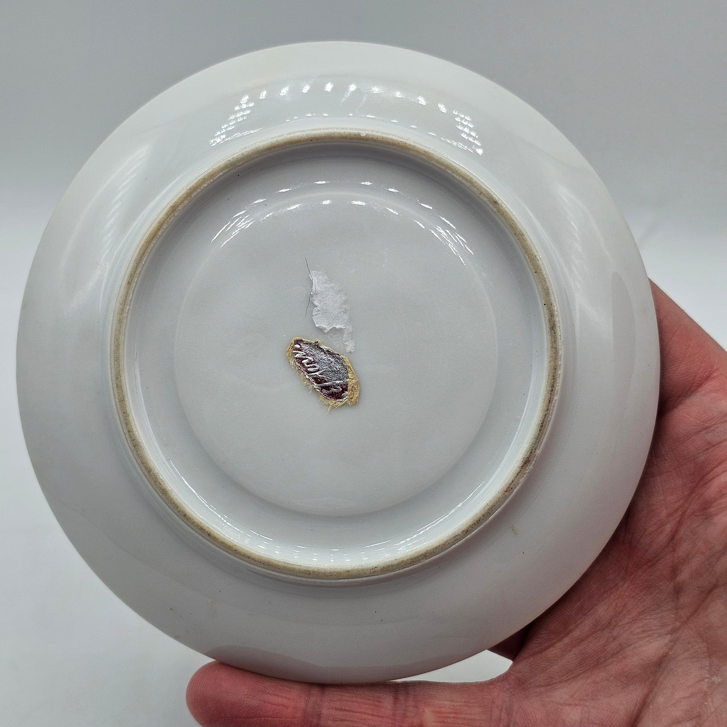 Vintage Royal Vienna Style Porcelain Saucer Featuring a Fragonard-Style Courting Couple Design, Square Cup Indent and Extensive Gold Gilt Trim
