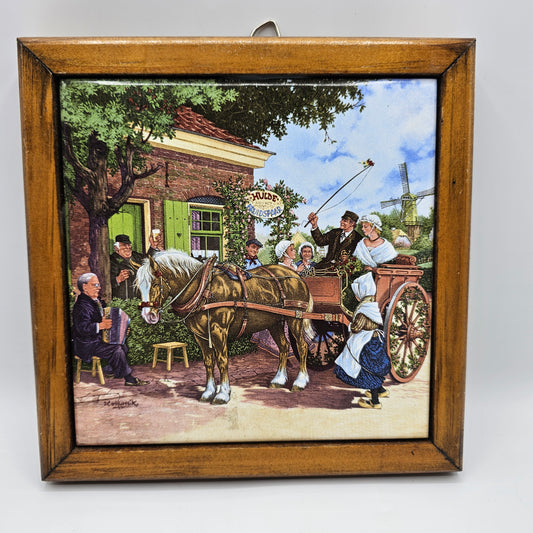 Vintage framed decorative ceramic tile featuring a traditional Dutch wedding scene titled "Hulde Bruidspaar" originally painted by artist J.C. van Hunnik and produced in Holland by Ter Steege