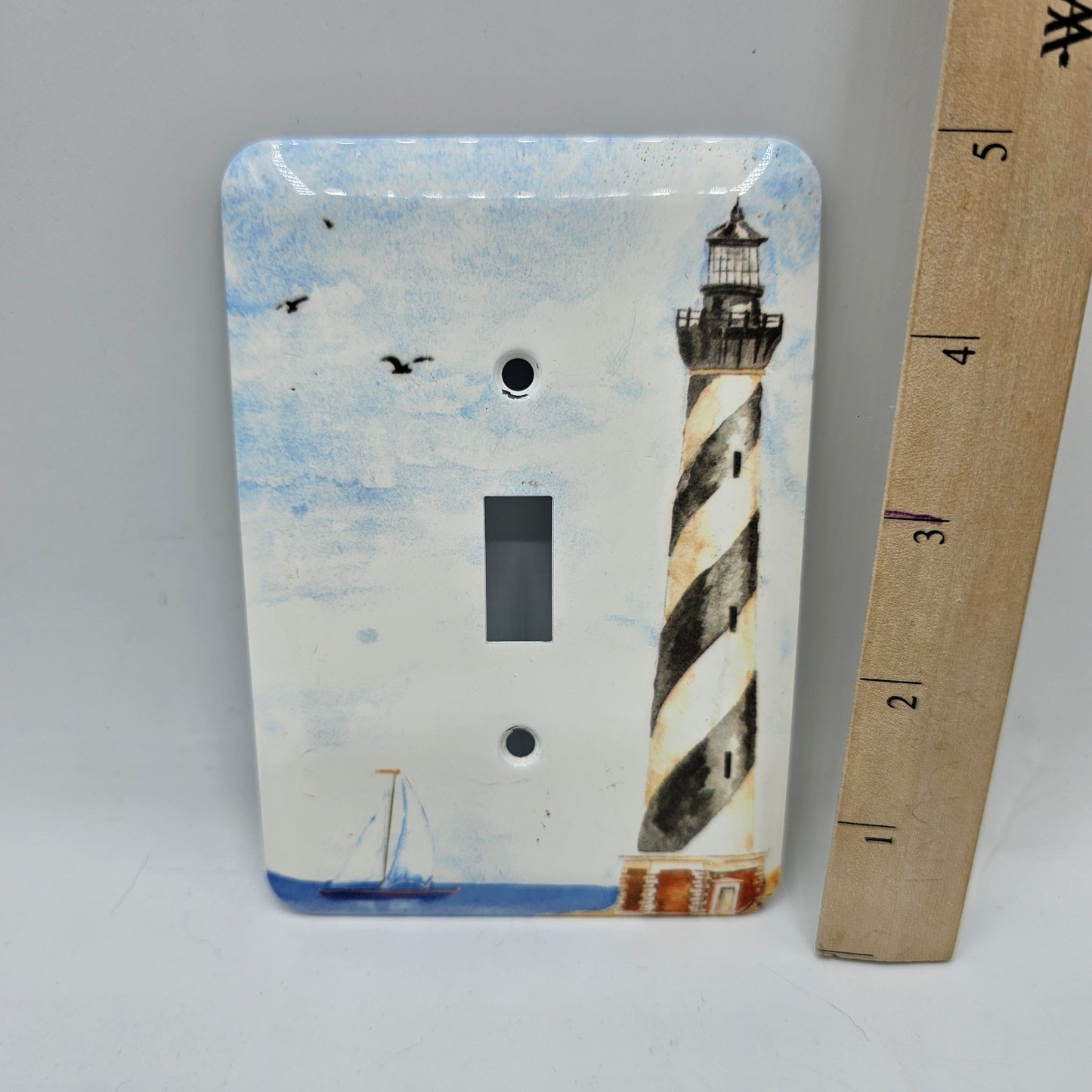 Lighthouse with Sailboat on Ocean Single Toggle Switch Light Switch Cover (metal)