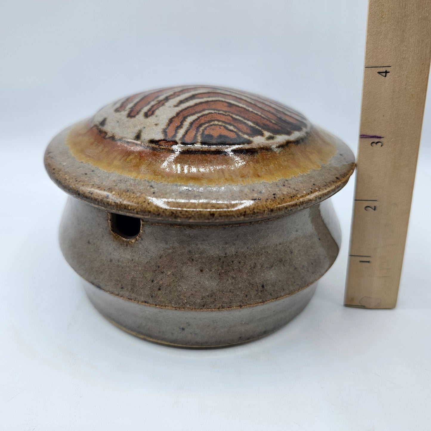 Art Pottery Lidded Jelly Jar or Honey Pot with Swirl Design and Spoon Cutout