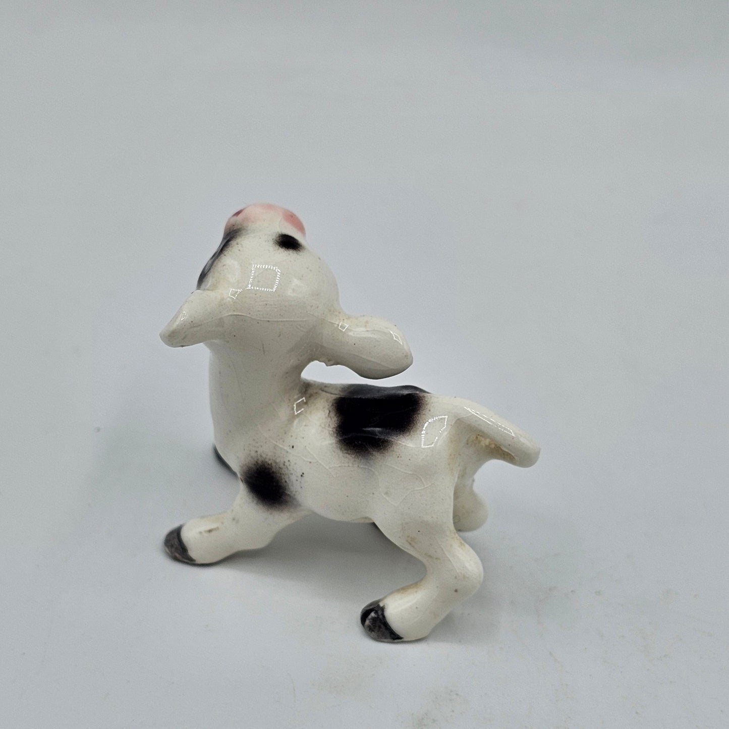 Miniature Calf Cow Porcelain Figurine