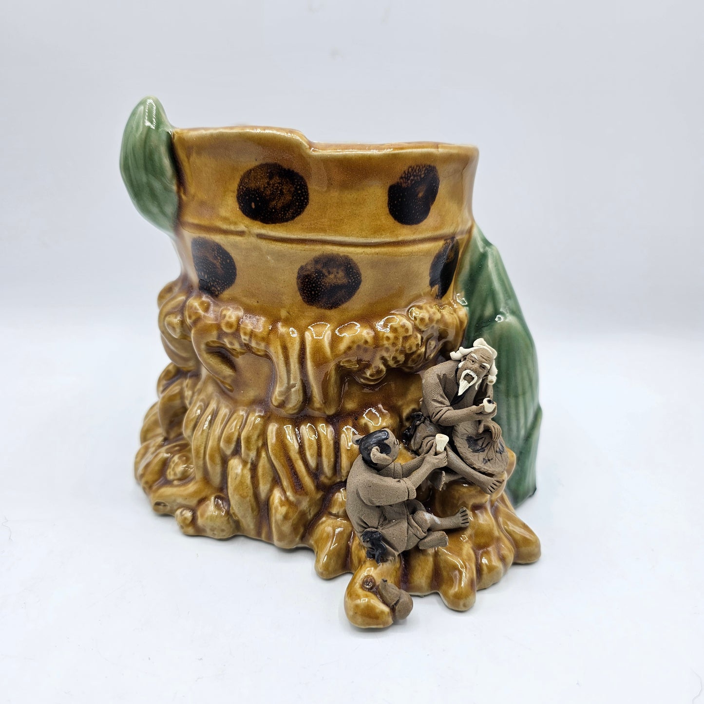 Ceramic Asian Vase with Applied Mud Men Figures