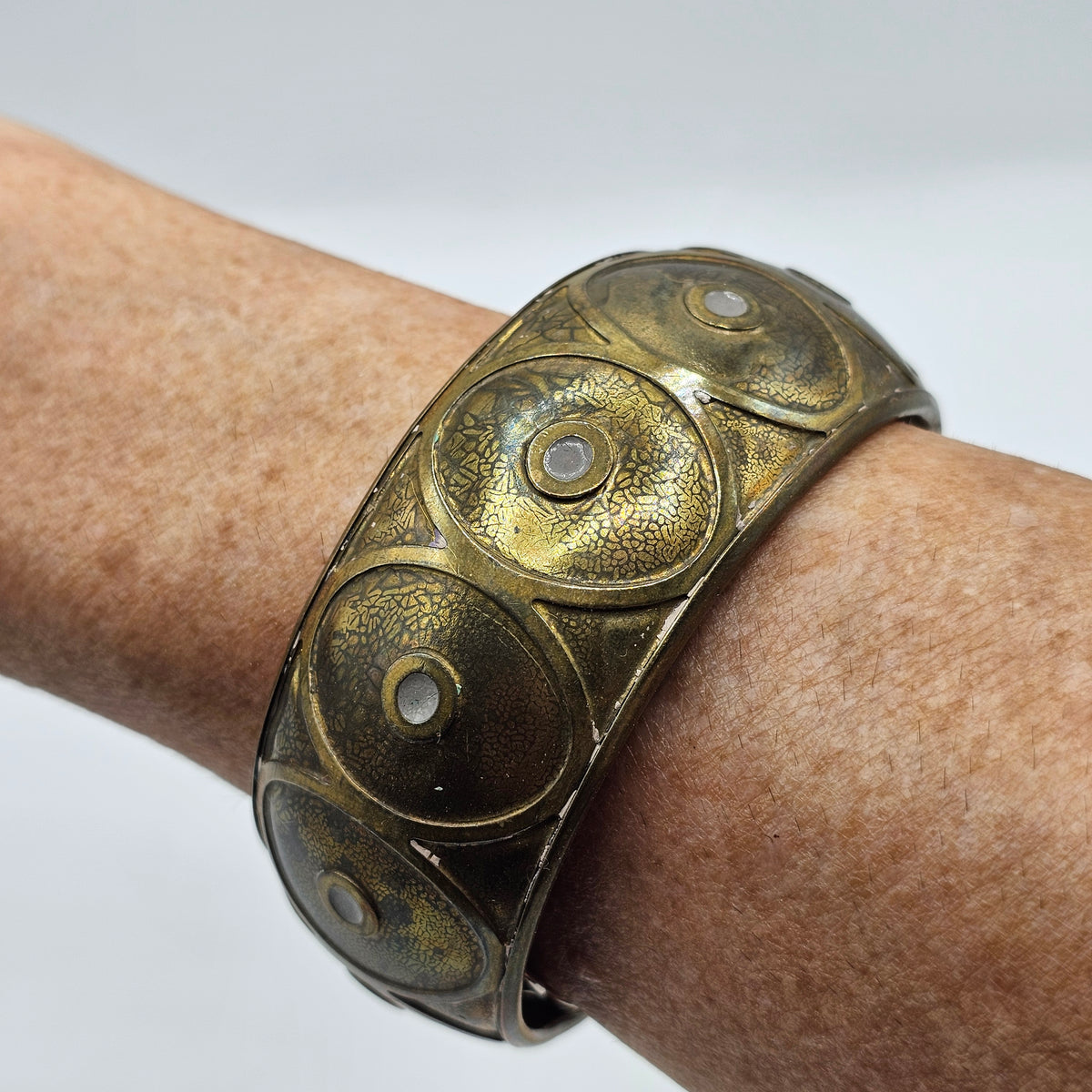 Brass Tone Chunky Bangle Bracelet with Inlaid Circles