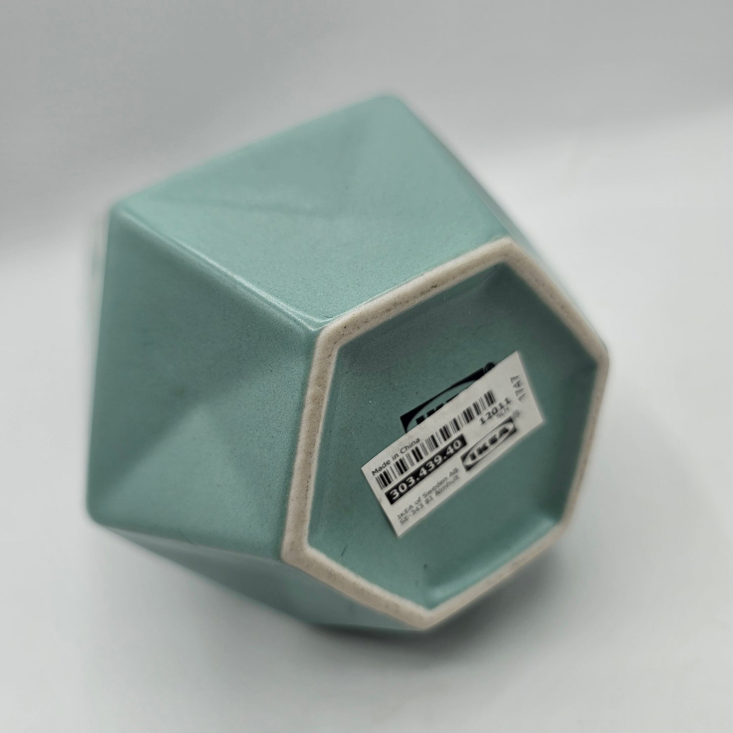 IKEA LIVSLÅNG vase in green with a faceted hexagon shape