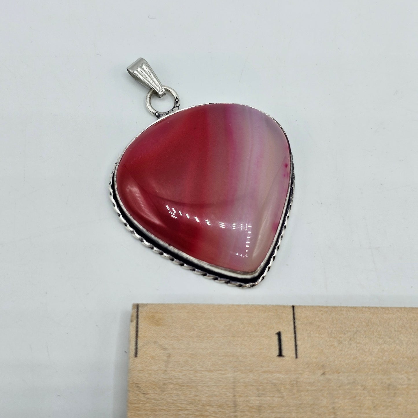 UV Reactive Banded Pink Onyx Stone Teardrop Pendant