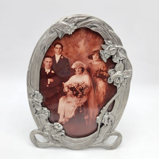 Oval Pewter Picture Frame with Daffodils and Vintage Wedding Photograph