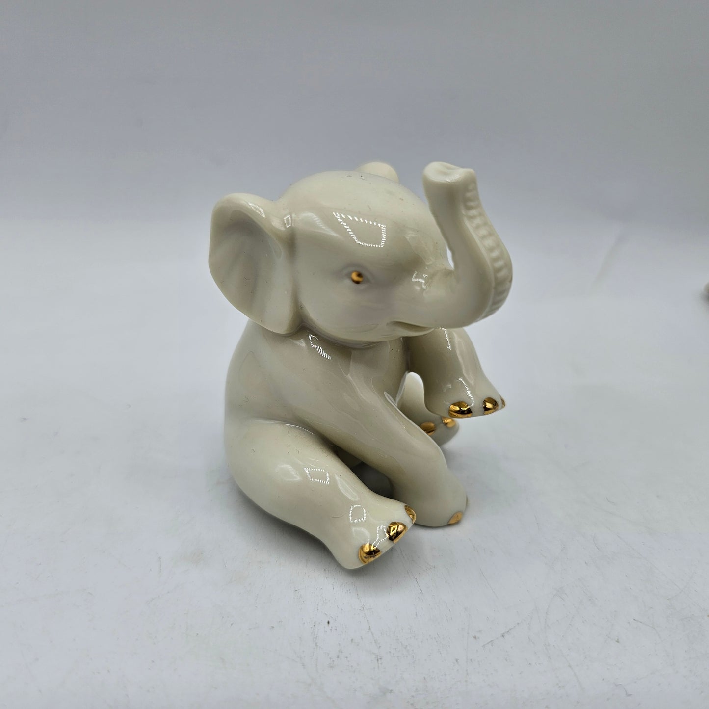 Lenox Sitting Baby Elephant Porcelain Figurine with 24K Gold Accents