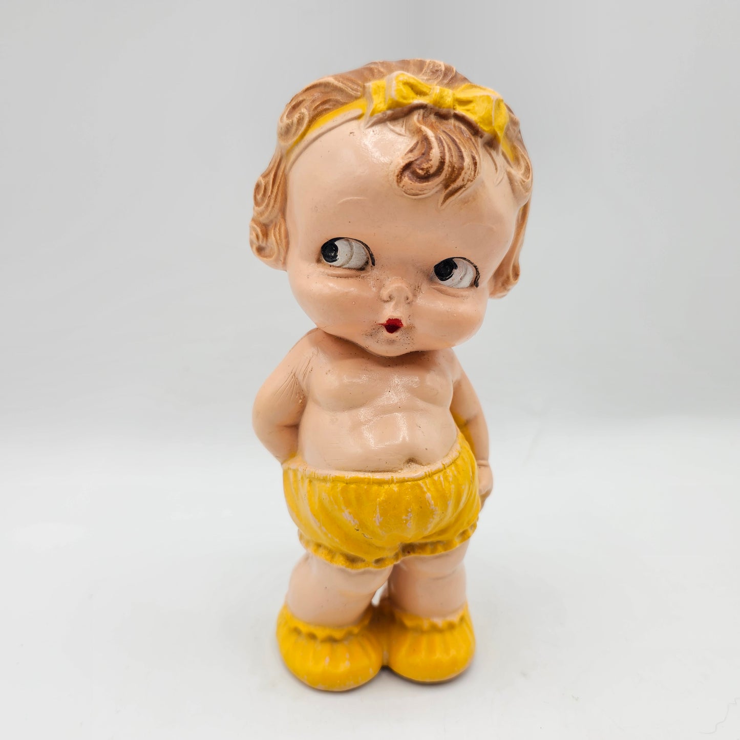 Vintage 1940's Kewpie Style Celluloid Rattle Baby Doll - Rare Yellow Outfit - Made in USA by Irwin (damage noted)