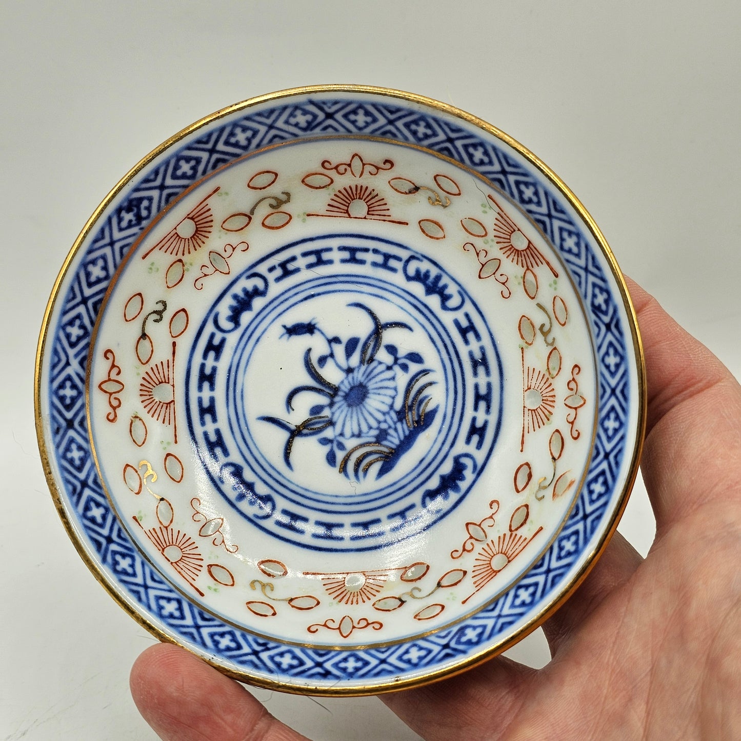 Blue, White and Red Painted Rice Grain Sauce Bowl