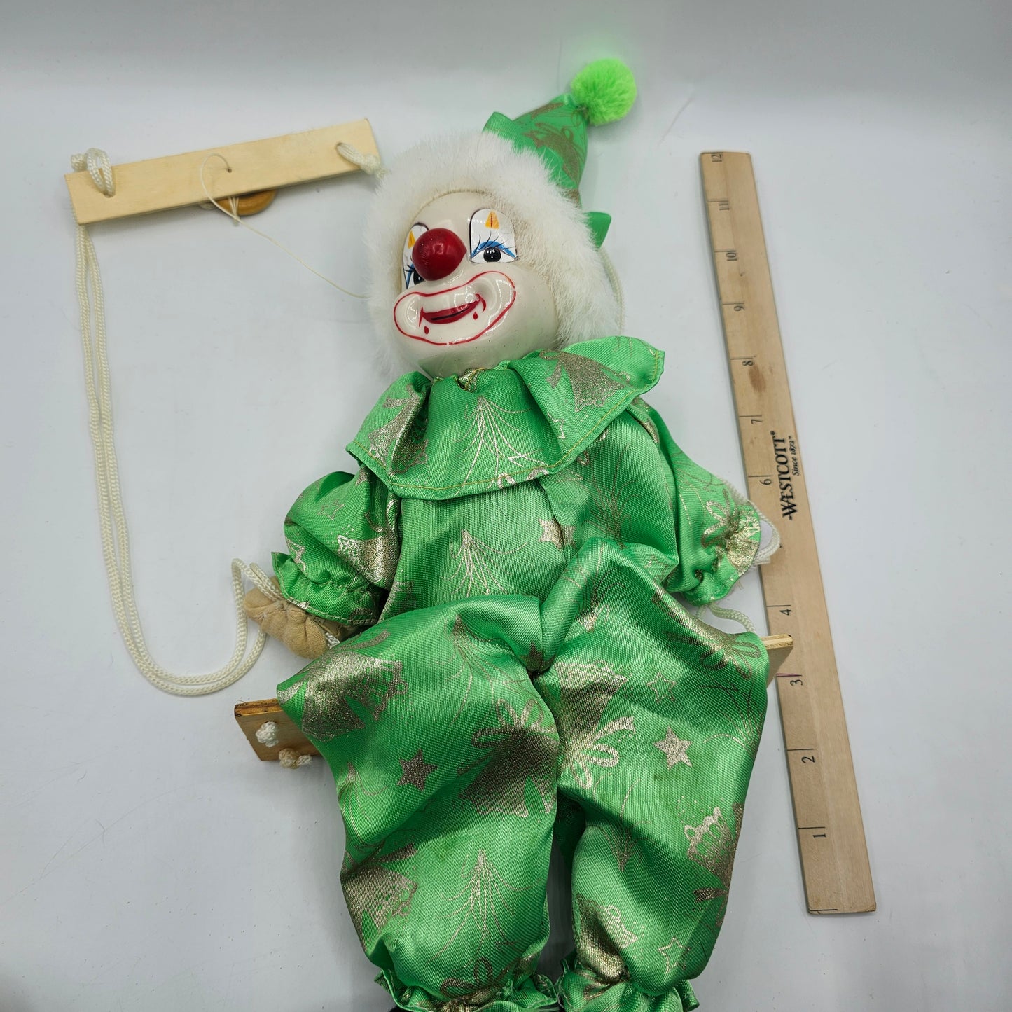 Vintage Green Swinging Clown with Hand Painted Ceramic Face