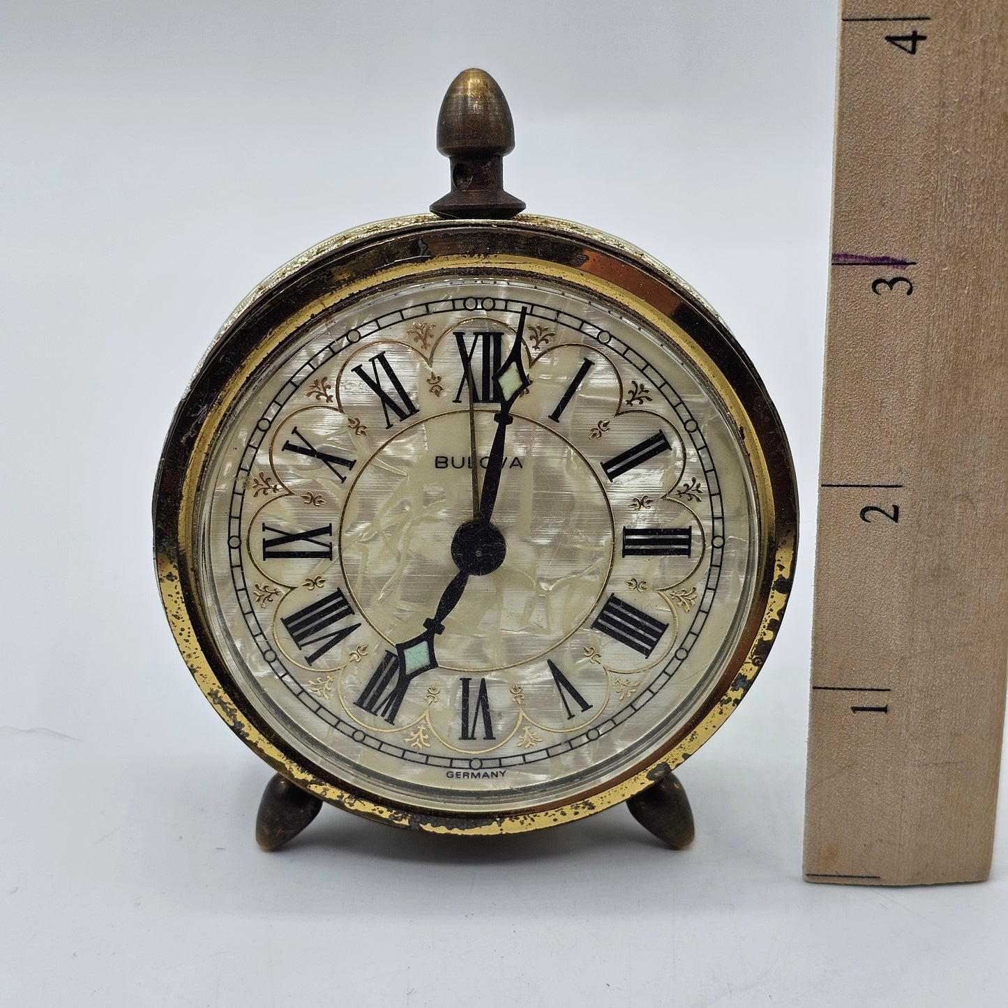 Vintage Bulova Wind Up Alarm Clock with Mother of Pearl Face and Gold Tone Lace Metal Accents - Made in Germany- DISPLAY OR PARTS ONLY DOESN'T WORK