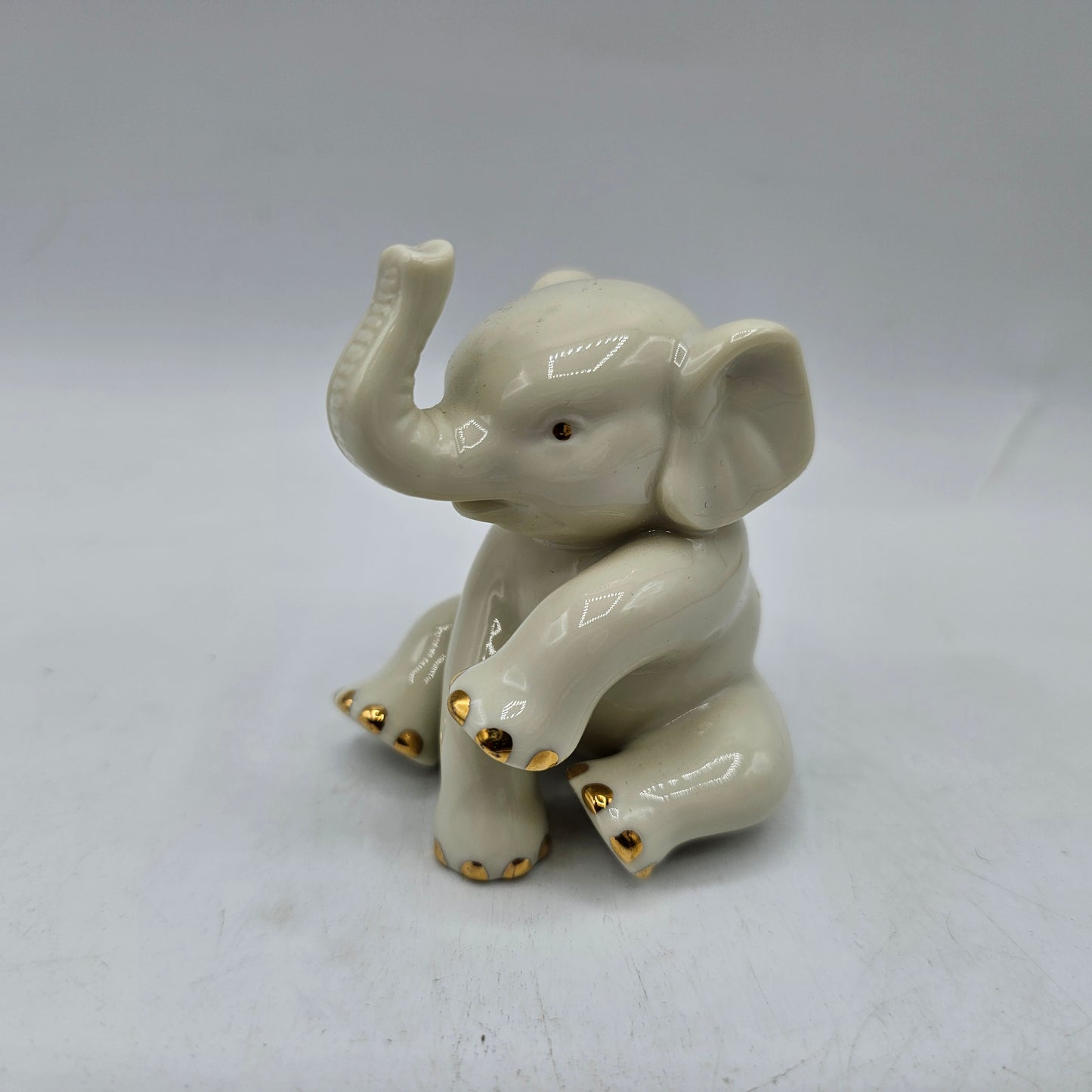 Lenox Sitting Baby Elephant Porcelain Figurine with 24K Gold Accents