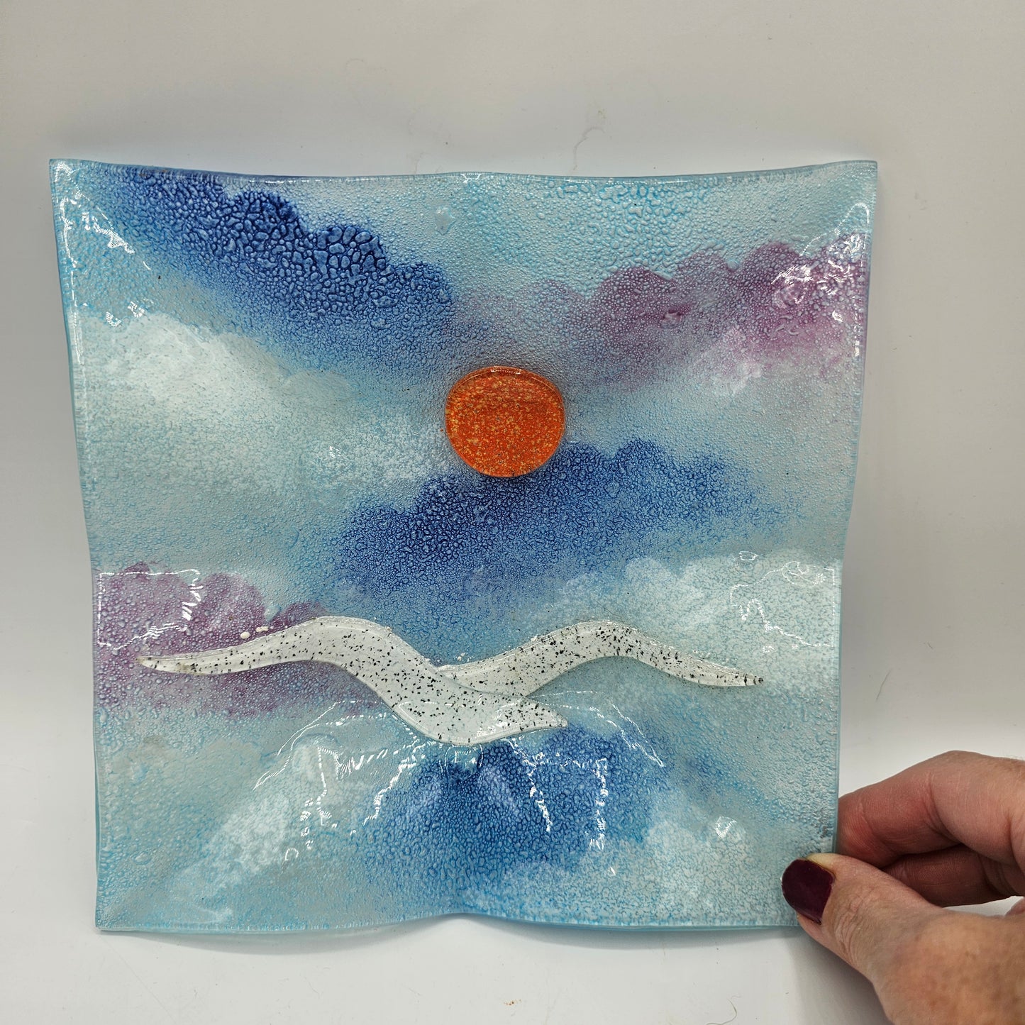 Italian Fused Art Glass Plate Featuring a Seagull and a Sun over the sea.