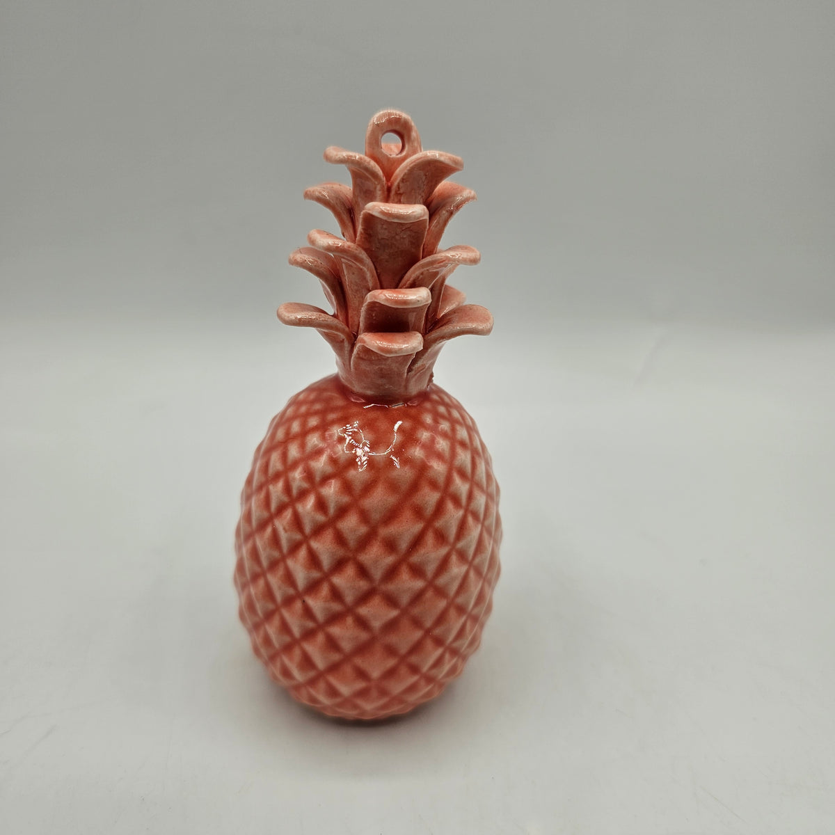 Pink Ceramic Pineapple Ornament with hole for hanging and hole in base