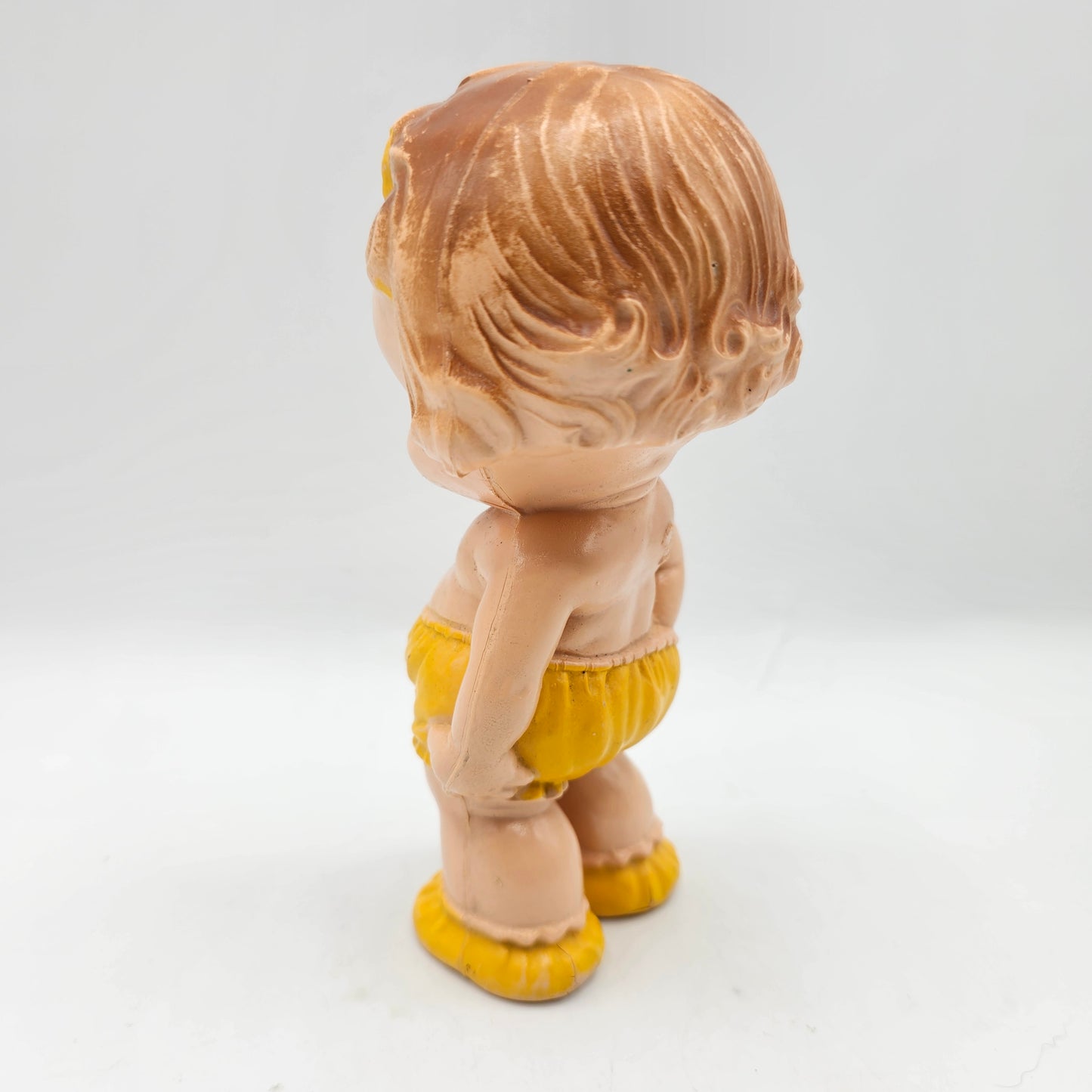 Vintage 1940's Kewpie Style Celluloid Rattle Baby Doll - Rare Yellow Outfit - Made in USA by Irwin (damage noted)