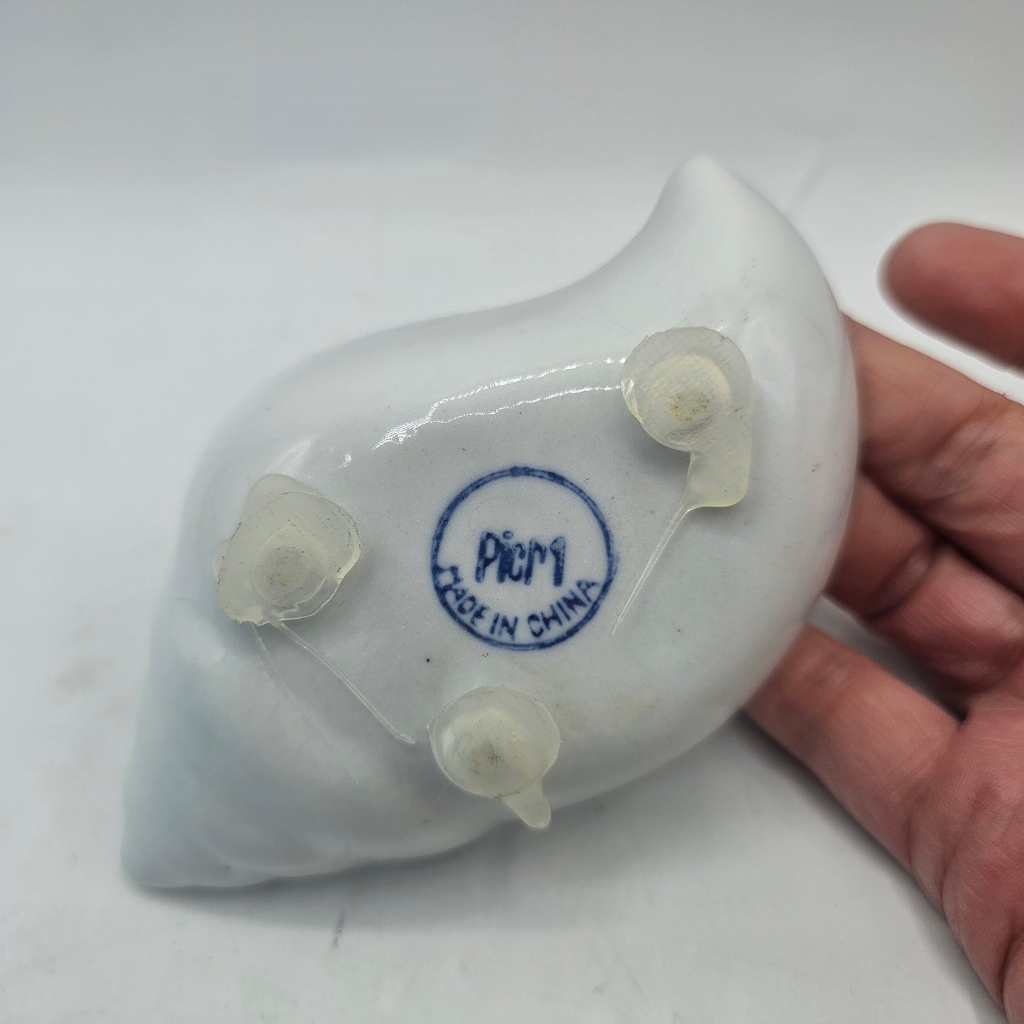 Small Blue and White Tower Shell Shaped Ceramic Trinket Dish with Fish Design