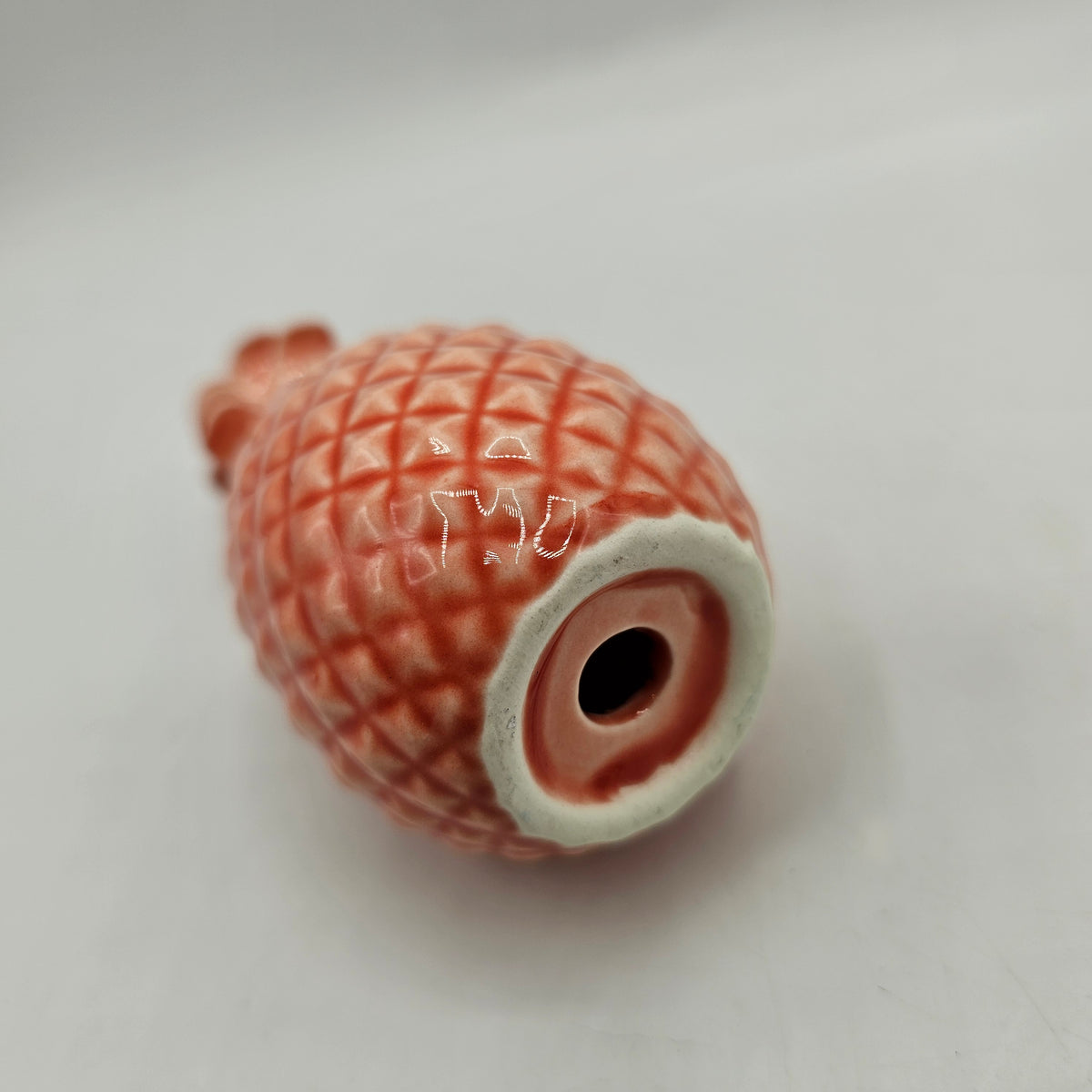 Pink Ceramic Pineapple Ornament with hole for hanging and hole in base
