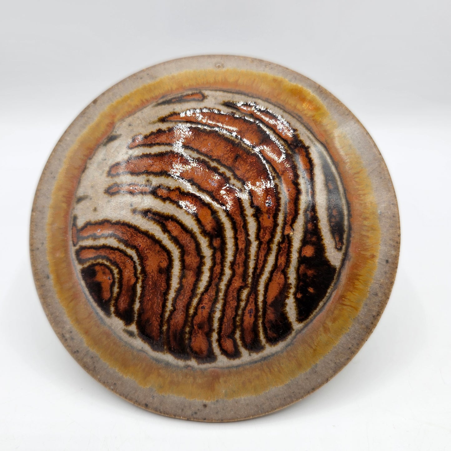 Art Pottery Lidded Jelly Jar or Honey Pot with Swirl Design and Spoon Cutout