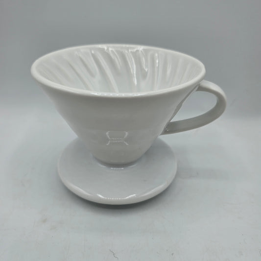 White Ceramic Coffee Pour Over. Sits on Cup to Make a Single Cup of Coffee.